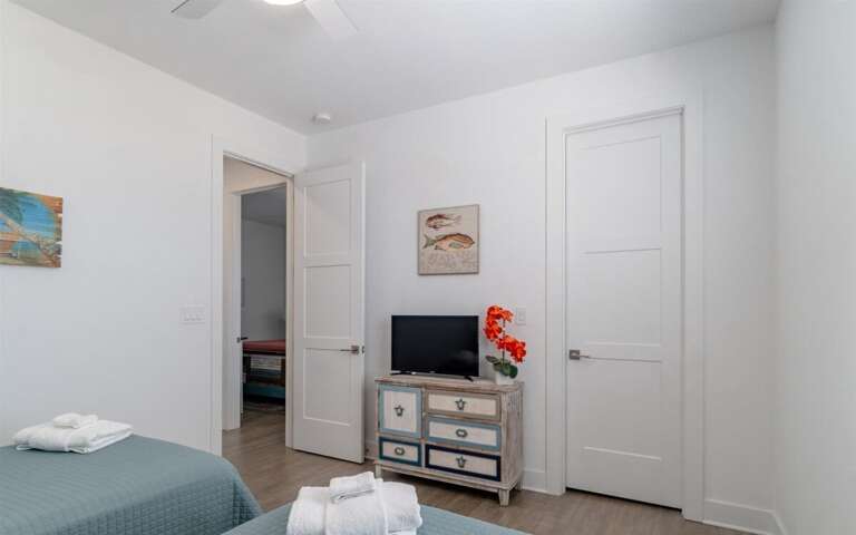 First double twin bedroom with smart TV on the 2nd level.