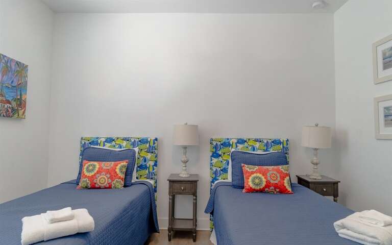 Two of two double twin bedroom with smart TV on the 2nd level.