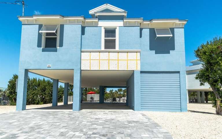 Front of the home & carport.