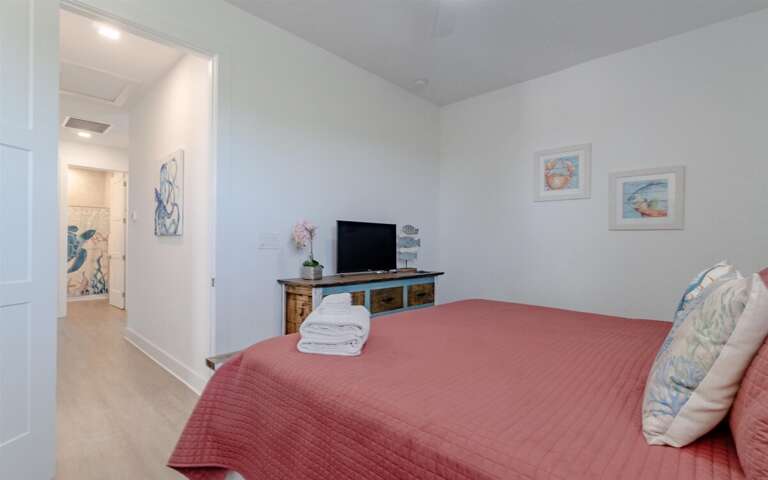 Queen bedroom with ensuite bath and smart TV on the 2nd level.