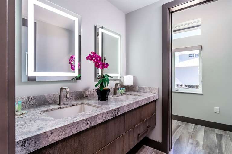 1st level downstairs guest bathroom with twin sinks. 1st level downstairs guest bathroom with twin sinks.