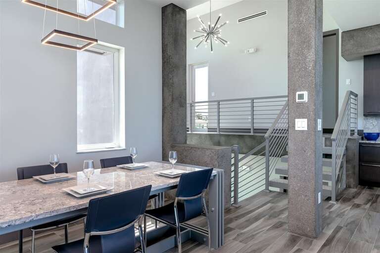 2nd level main dining area with views out over the water. 2nd level main dining area with views out over the water.