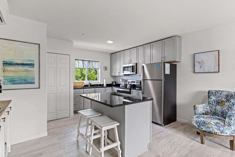 Granite countertops & stainless steel appliances.