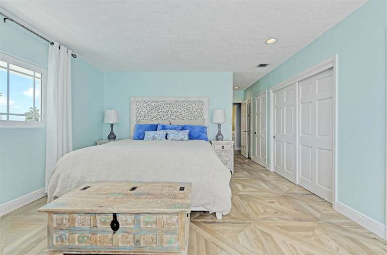 2nd level master bedroom overlooking the water