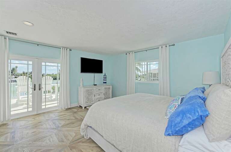 2nd level master bedroom with Smart TV