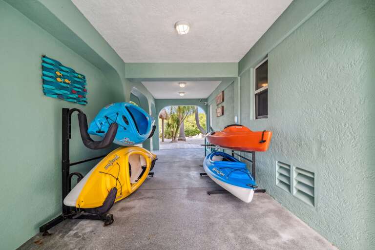Kayaks and paddleboards available for guest use at Marathon vacation rental.