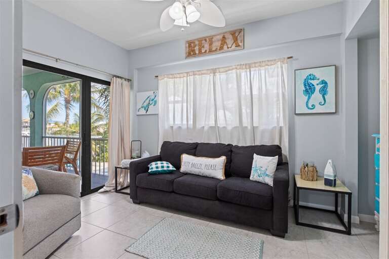 Upstairs sleeping area with patio access