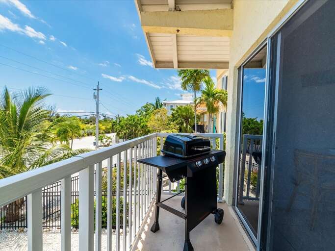The balcony with a grill. The balcony with a grill.