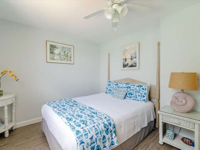 Bedroom 2 with a queen bed on the 1st level. Bedroom 2 with a queen bed on the 1st level.