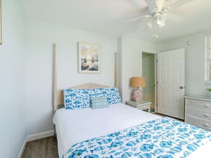 Bedroom 2 with a queen bed on the 1st level. Bedroom 2 with a queen bed on the 1st level.