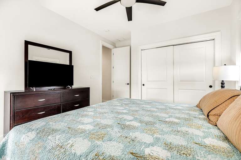 3rd level bedroom 3 with a king bed.