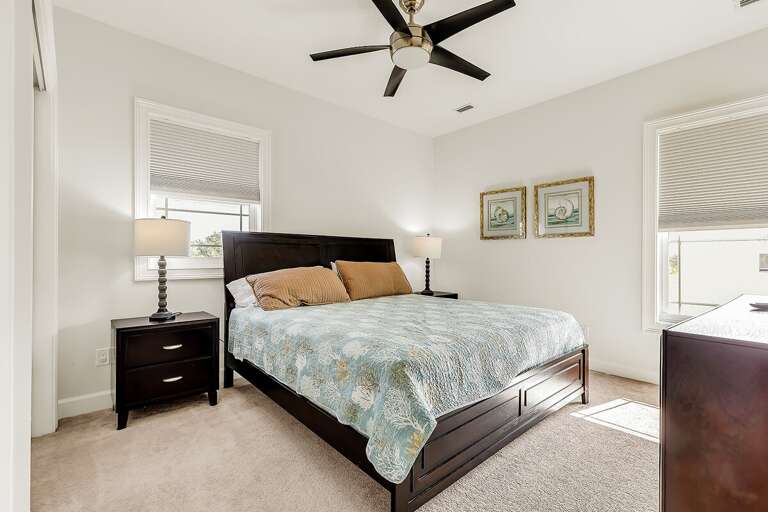 3rd level bedroom 3 with a king bed.