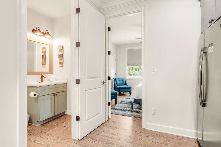 Easy access to the bathroom right by the kitchen.