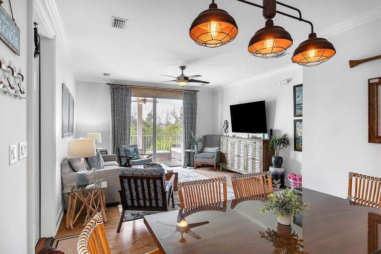 Experience a seamless flow as the open concept living room and dining area welcome lots of natural light and encourage conversation, fostering a harmonious space for relaxation and shared meals.