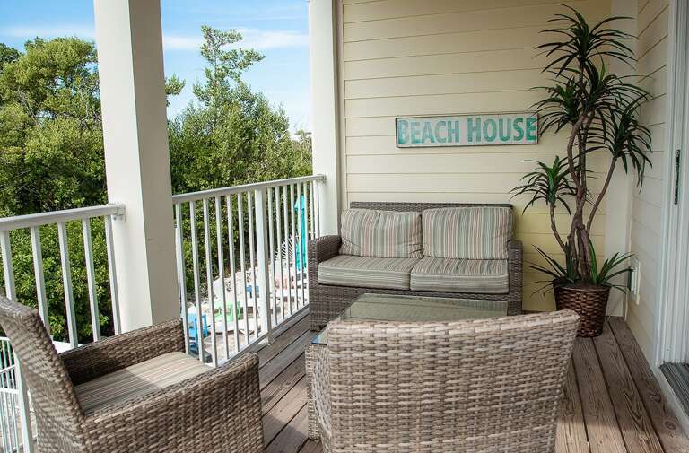 Serene views: Balcony overlooking the water.