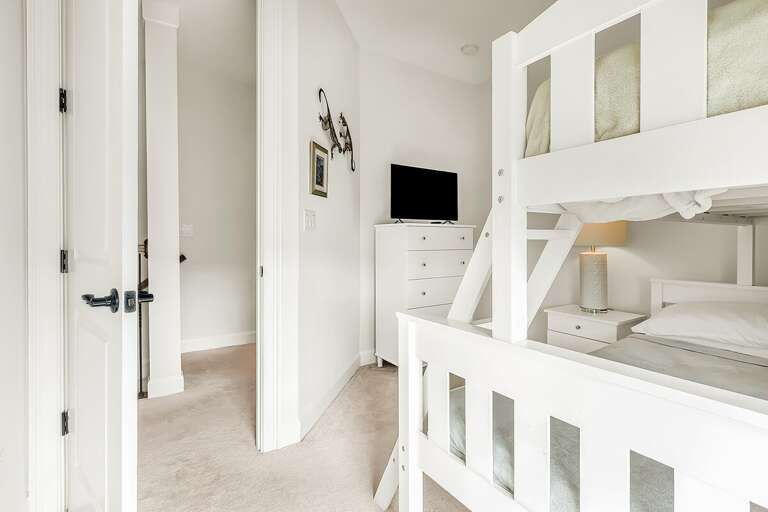 Sleepover central Our bedroom 3 on the 3rd level with bunk bed with a twin over double offers cozy quarters for kids and guests alike.