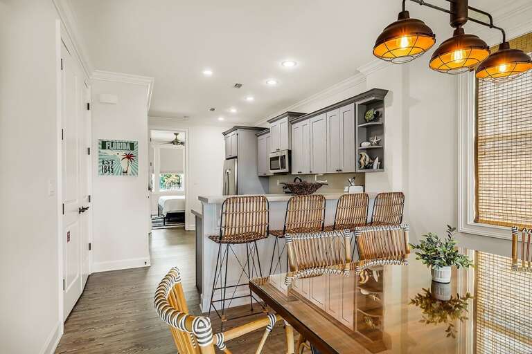 Unite & dine: Seamless open concept kitchen and dining area.