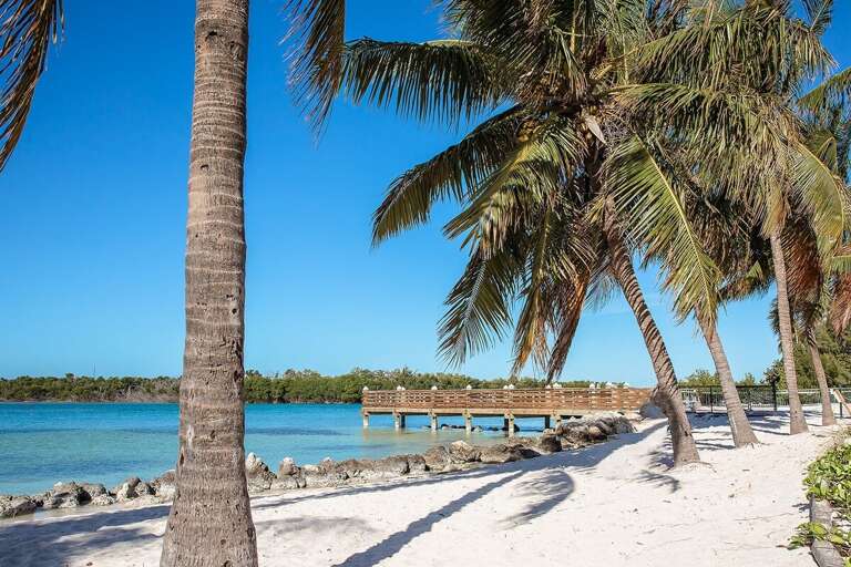 Under the warm embrace of the Florida sun, Sombrero Beach casts its spell of serenity and bliss, inviting you to bask in its sandy shores and azure waters.