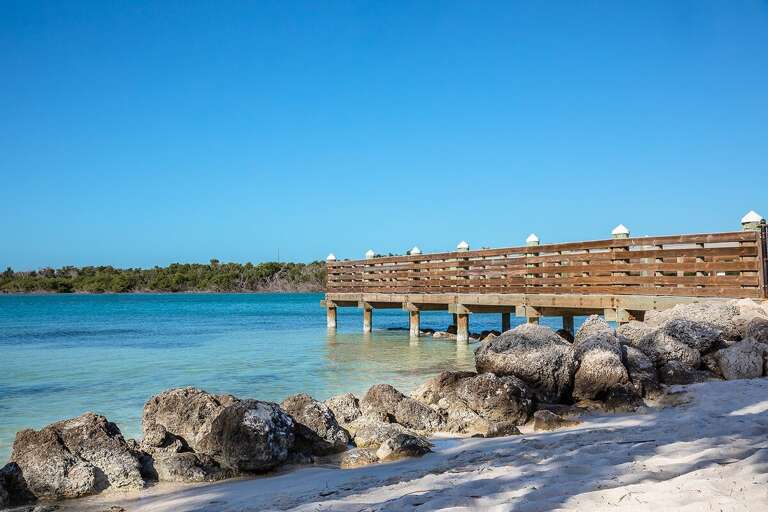 Under the warm embrace of the Florida sun, Sombrero Beach casts its spell of serenity and bliss, inviting you to bask in its sandy shores and azure waters.