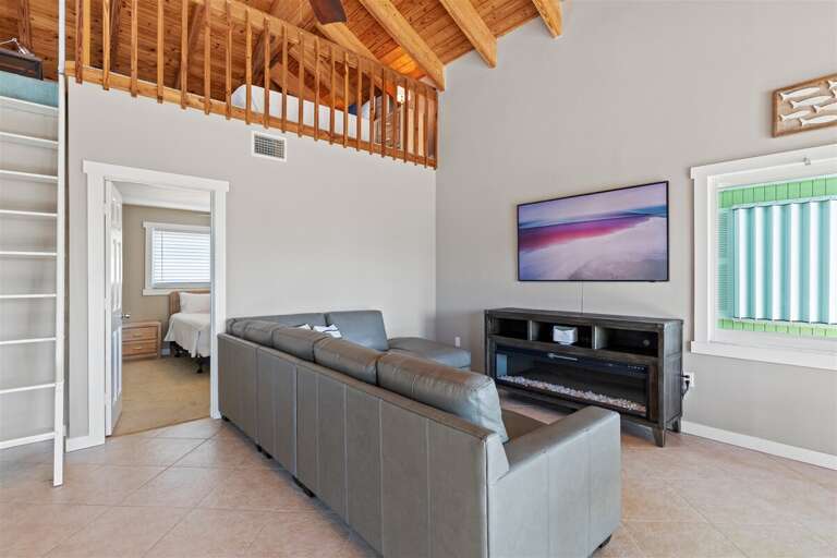 A living room, perfect for relaxation and entertainment, complete with a TV. A living room, perfect for relaxation and entertainment, complete with a TV.