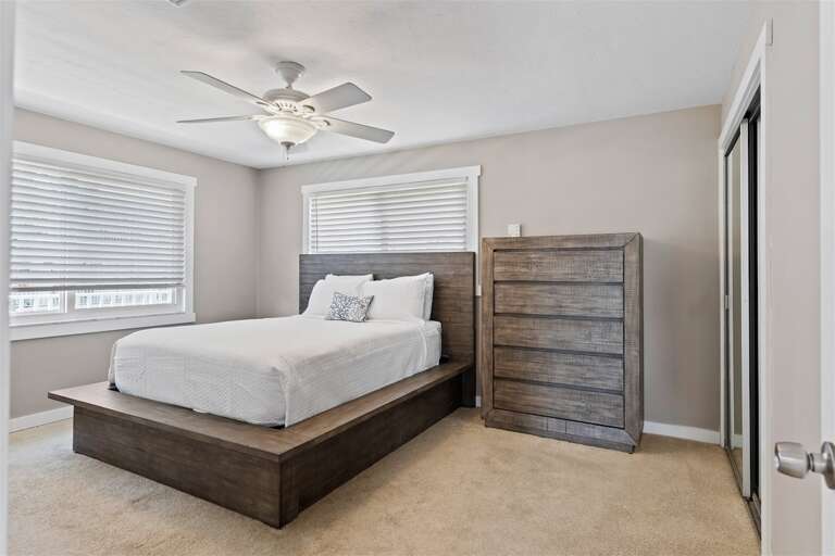The master suite with a queen bed and ensuite bathroom. The master suite with a queen bed and ensuite bathroom.