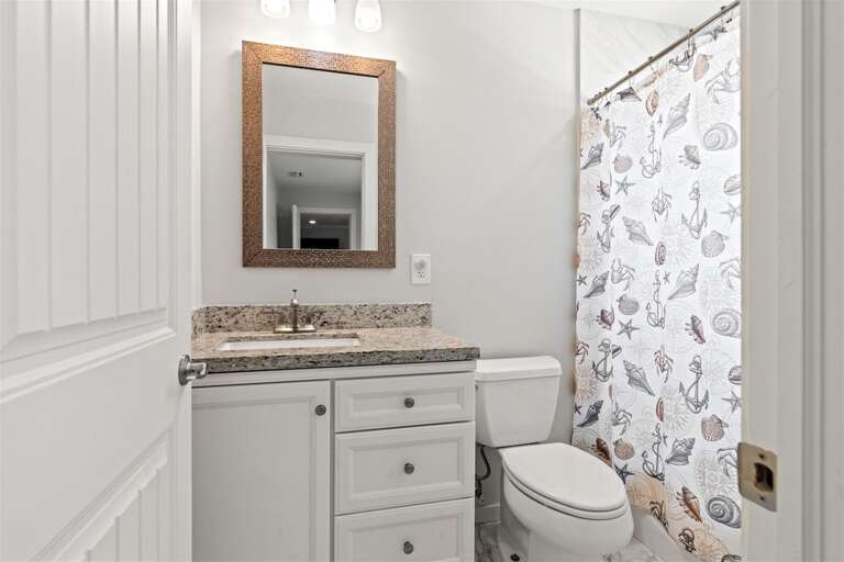 Full bathroom 4, off living area.