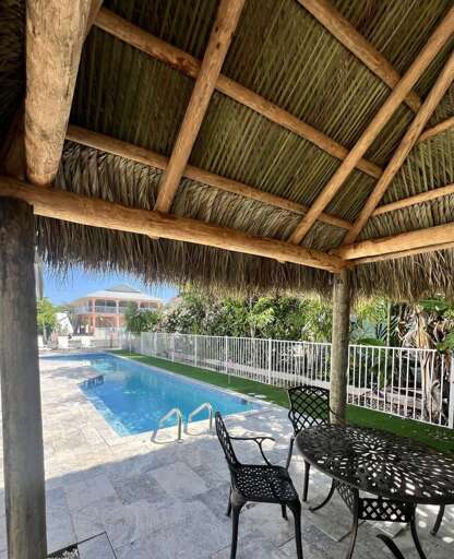 Soak up the vibes in our brand-new poolside Tiki Hut — your perfect lounge spot!