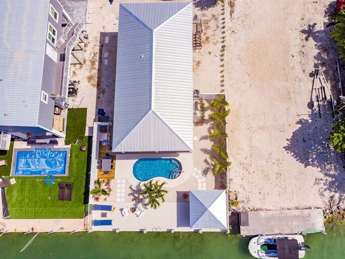 Aerial view of this 3 bed/2 bath private pool home.