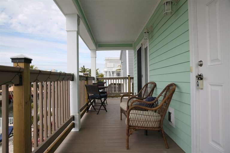 Our balcony offers the perfect spot to sit back, relax, and soak in the scenery .