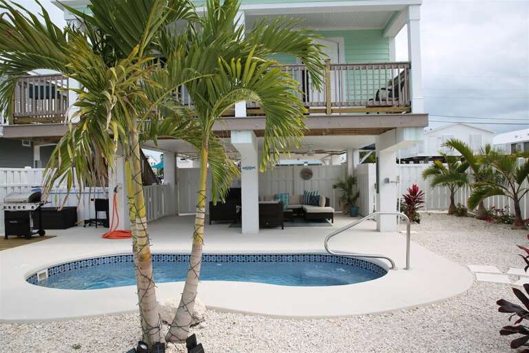 Take a dip in our private heated pool oasis, offering a cozy retreat with dimensions of 10ft x 20ft and a depth of 5ft.