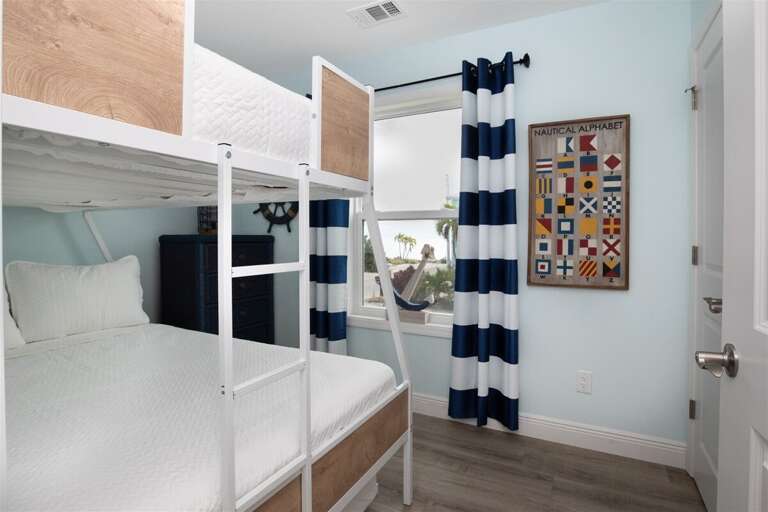 Double the beds, double the fun in this bunk bed room on the 2nd level.