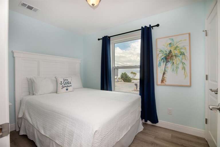 Embrace comfort in every corner in our queen bed room on the 2nd level.