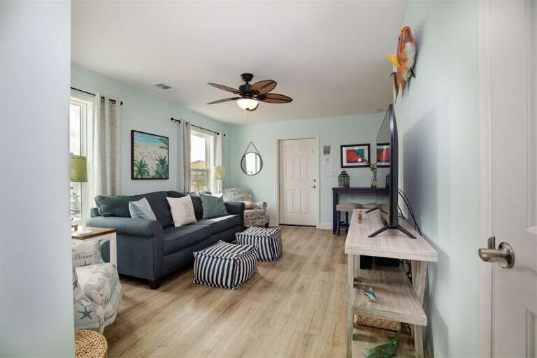 Our living room invites you to sink into comfort while immersing yourself in your favorite shows and movies.