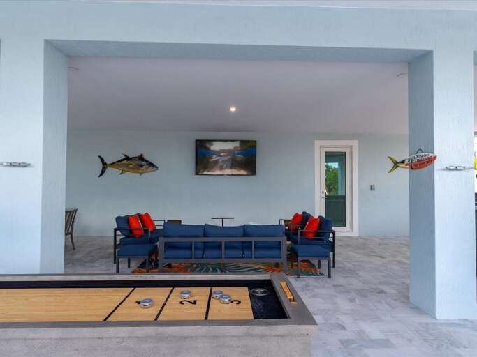 Outdoor TV lounge area.