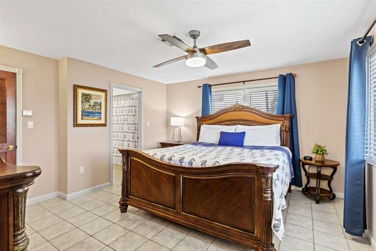 1st level bedroom 2 with a king bed.