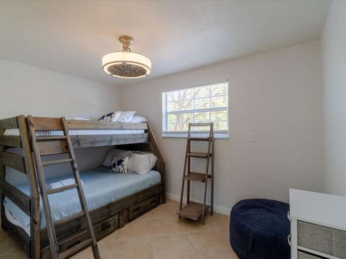 1st level bunk bed room with twin and full beds