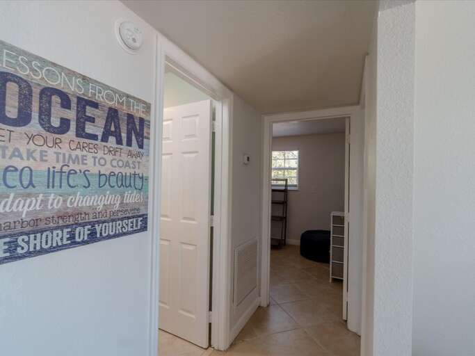 Hallway to bedrooms and bathroom