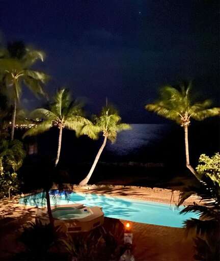 Lounging by the pool can occur day or night