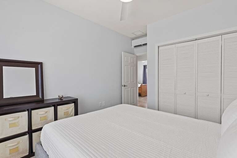 2nd level bedroom with cozy queen bed.