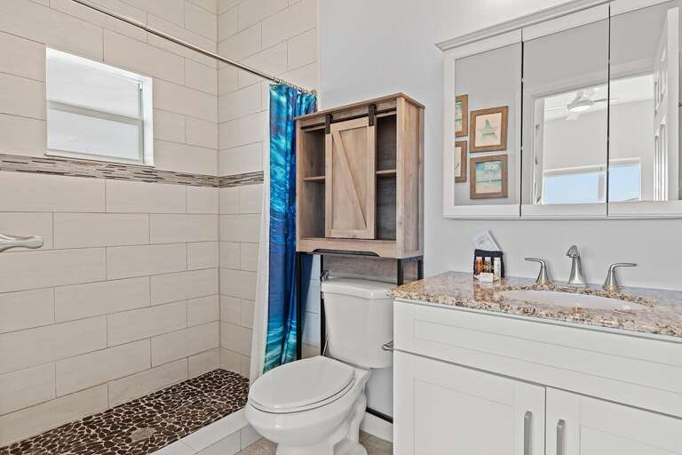 Ensuite master bathroom with walk-in shower.