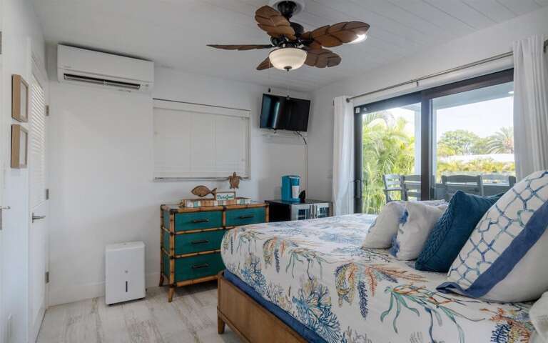 Bedroom 4 on the 1st level, a cozy haven with a queen-sized bed, complete with entertainment and climate control for the ultimate in comfort. Bedroom 4 on the 1st level, a cozy haven with a queen-sized bed, complete with entertainment and climate control for the ultimate in comfort.