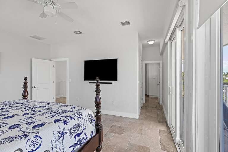 Sink into a king-sized bed overlooking the endless ocean expanse, complete with your own private TV Sink into a king-sized bed overlooking the endless ocean expanse, complete with your own private TV