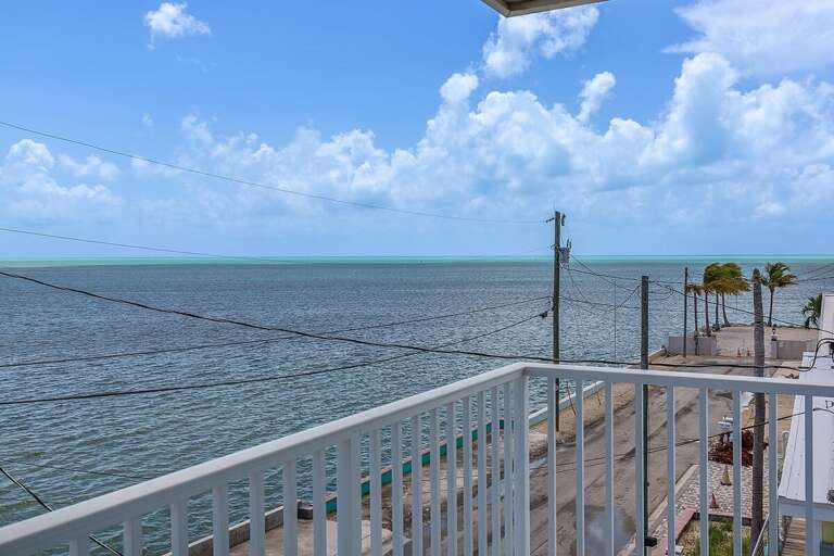 Soak in the mesmerizing ocean panorama from the private balcony of our third-floor master suite. Soak in the mesmerizing ocean panorama from the private balcony of our third-floor master suite.