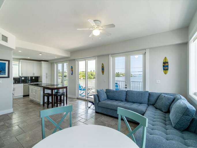 Unwind in this interconnected living room and kitchen. Unwind in this interconnected living room and kitchen.