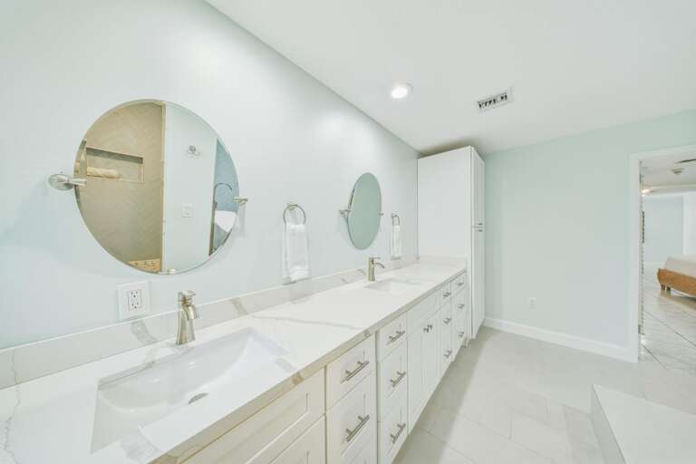 Perfect for couples and families, this spacious vanity area combines functionality and luxury within one of Marathon's finest waterfront vacation homes.