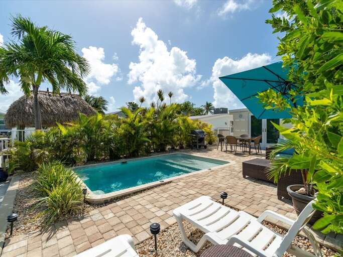 Your backyard with private pool and plenty of outdoor seating.
