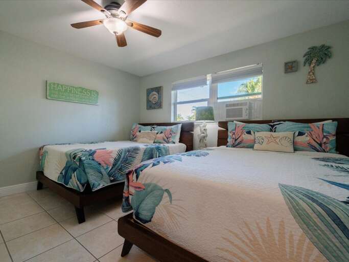 Bedroom 3 with 2 queen beds.