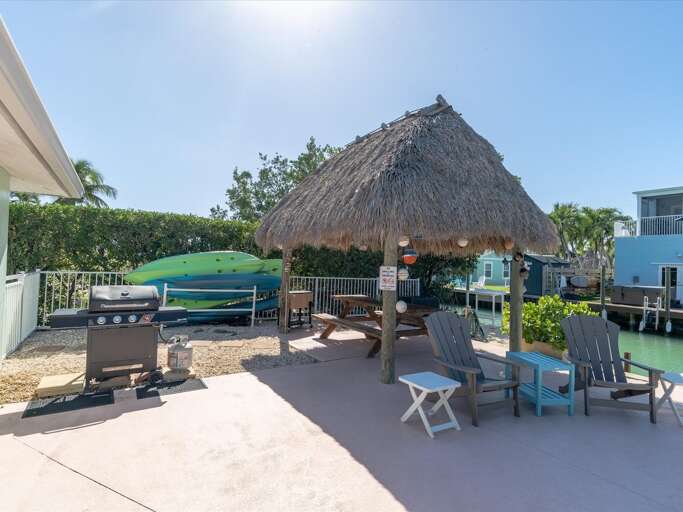 Tiki with picnic table seating.