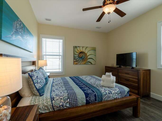 3rd level bedroom 3 with a queen bed. 3rd level bedroom 3 with a queen bed.