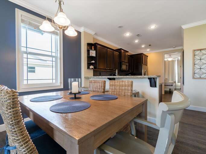 Gather around the table in this elegant dining room, perfect for creating lasting memories over every meal Gather around the table in this elegant dining room, perfect for creating lasting memories over every meal